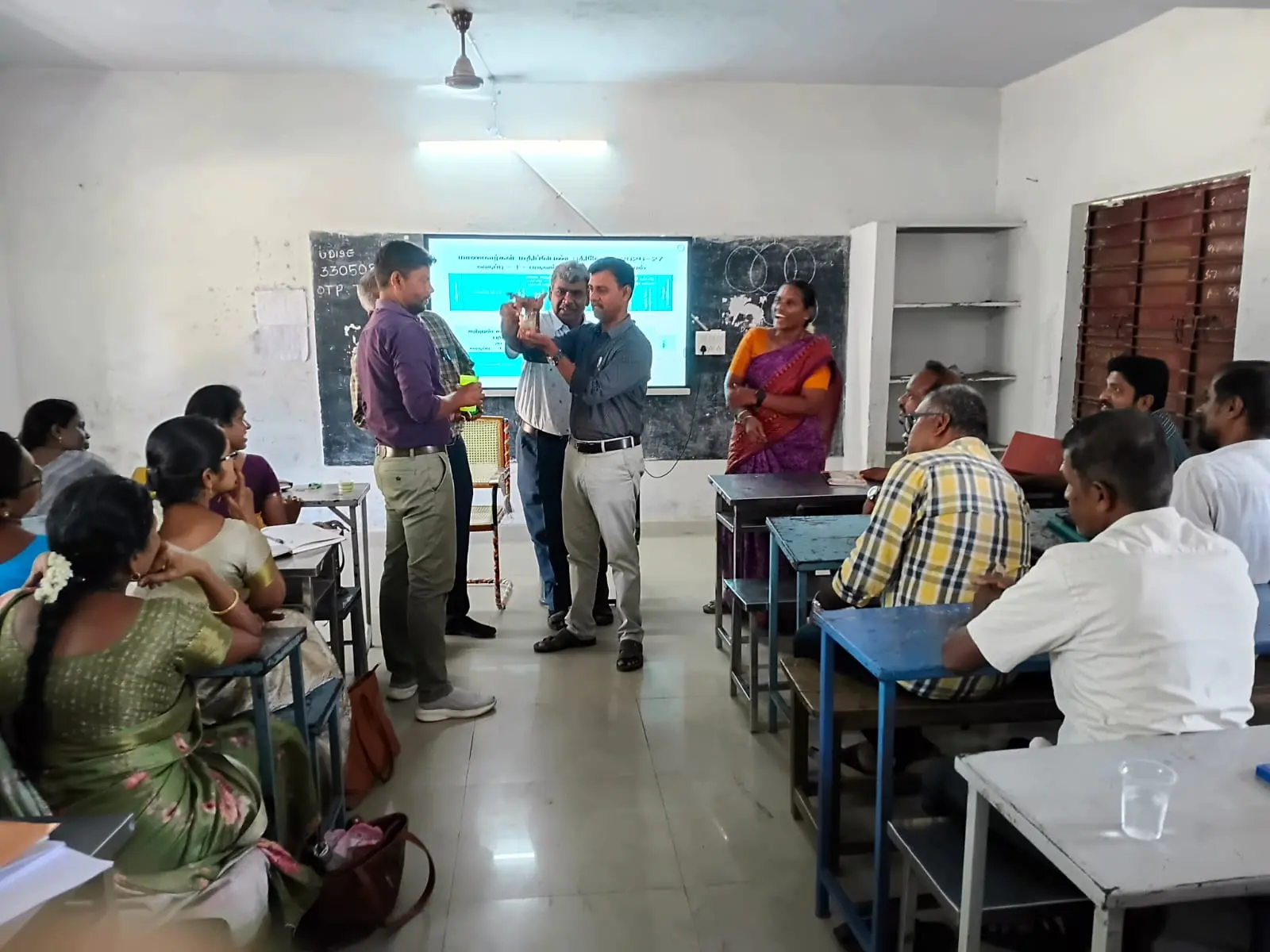 The Respected Principal visited the New Textbook Training Programme at Harur Block and interacted with the Resource Person during the demonstration of the Surface Tension experiment.